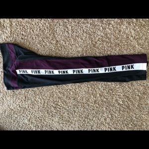 Dark gray and maroon yoga pants with white print